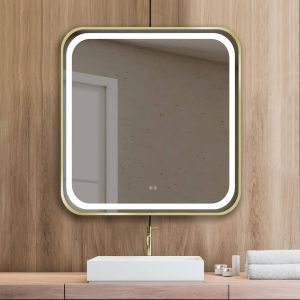 Espejo modelo Klara Rectangular de Xpertials en acabado oro en un ambiente de baño